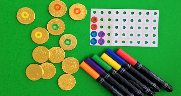 Coloring in the dots for the Gold Candy Coin Memory Game.  More at ActivitiesForKids.com 