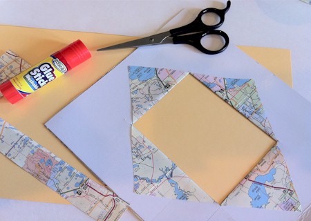 Recycle a map and create a frame.  ActivitiesForKids.com