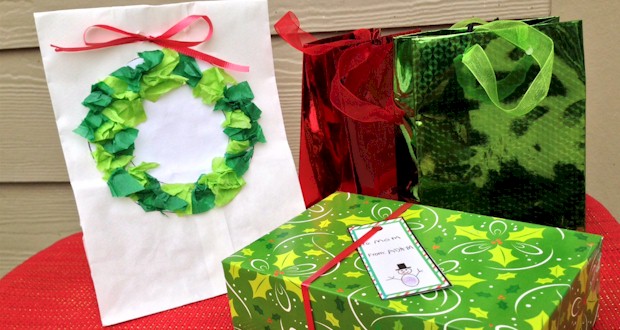 Only pennies to make, this gift bag is great for younger children. Easy classroom project..  Holiday Snowman Thumbprint gift tags - more at ActivitiesForKids.com