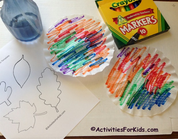 Colorful coffee filter leaves.  Use washable markers to create the beautiful fall colors.